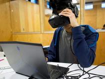 Student wearing a VR headset at the think[box]