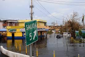 A flooded street of Puerto Rico following a hurricane.