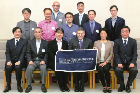 A group of CWRU Alumni in Japan are photographed at their annual dinner