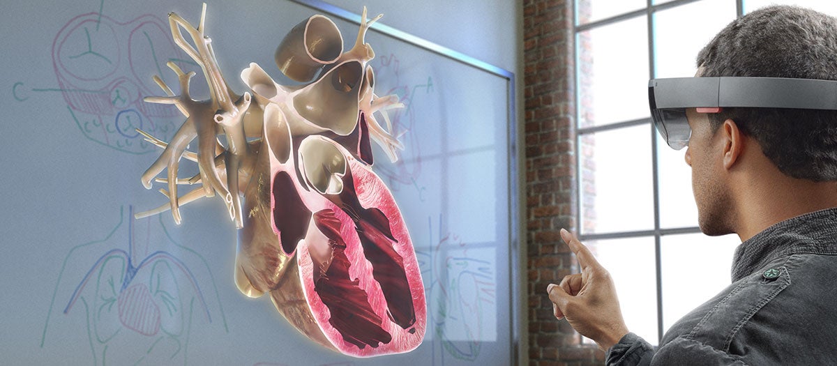 Photo of a student viewing the heart structure  with the HoloLens