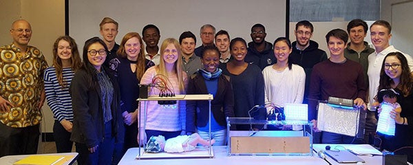 Photo of students with a prototype