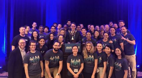 Group of Master of Science in Anesthesia Program students with trophy at AAAA conference