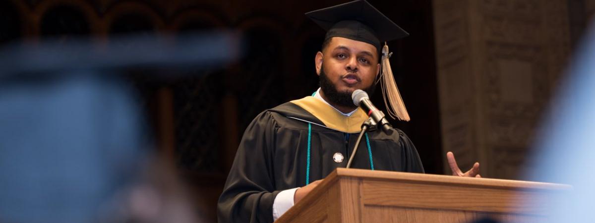 Student delivering speech at graduation