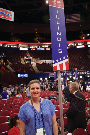 CWRU alumna Maureen O'Reilly stands on the floor of the RNC