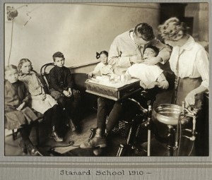Dental exam being performed in a classroom