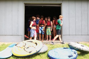 Campers wearing life jackets at camp