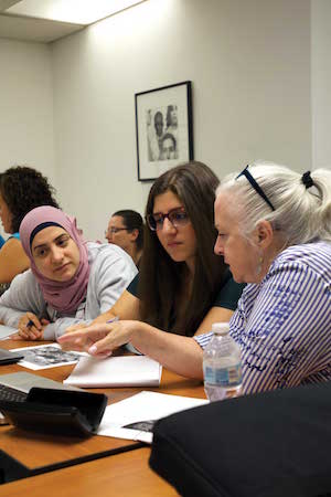 Mariam El Houchaimi, Carol Maamary, and Mary Terhaar conversing