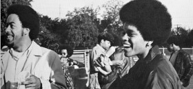 Black and white photo of two Case Western Reserve University African American Society members, Alvin Nichols and Joan Brooks, in the 1970s