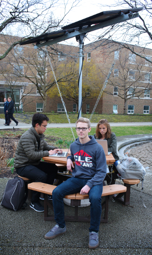 Case Western Reserve students refitted a picnic table for recharging electronic devices outdoors.