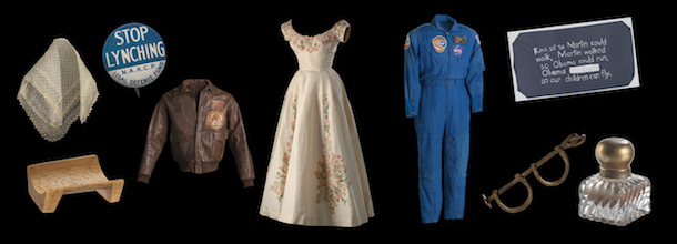 A collection of images of objects at the Smithsonian African American history museum: Harriet Tubman’s shawl; a boat seat; an NAACP pin that says “Stop Lynching”; a Tuskegee airman jacket; a white floral dress; a NASA flight suit; a banner that reads “Rosa sat so Martin could walk; Martin walked so Obama could run; Obama ran—and won—so our children can fly”; a set of shackles; and an inkwell