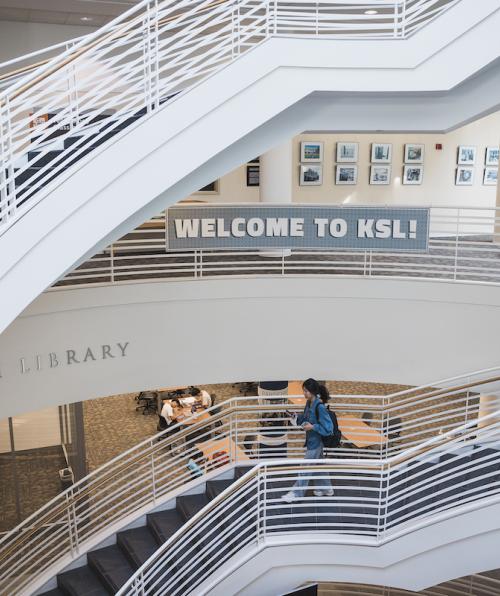 Students walk up a staircase in Kelvin Smith Library on Case Western Reserve University's campus.