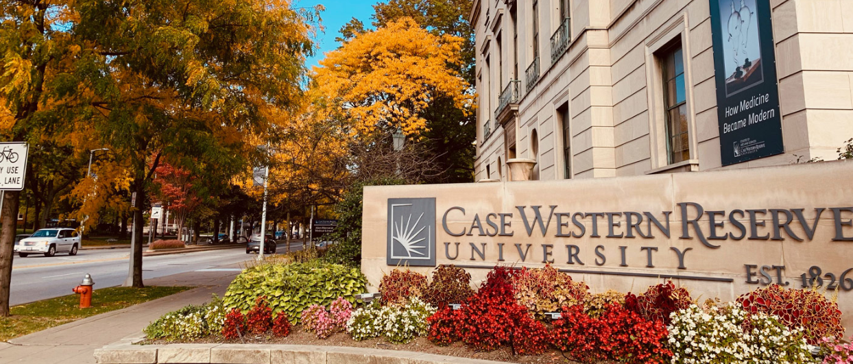Case Western Reserve University Sign in front of Fall Trees