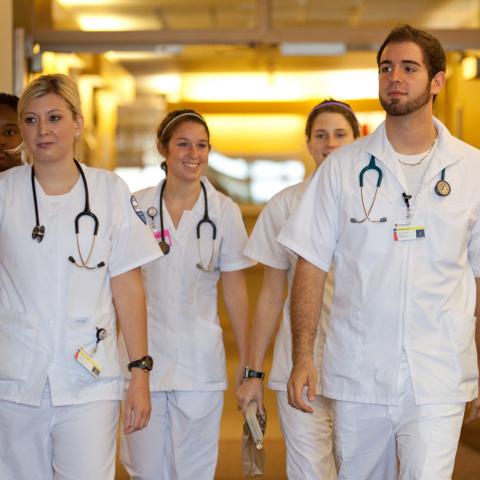 CWRU nursing students walking in scrubs