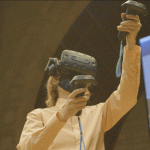 Engineering student in virtual reality goggles