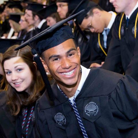 Case Western Reserve University student in graduation gown at graduation