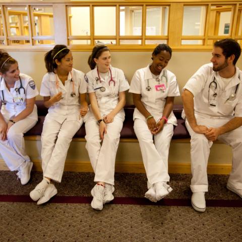 CWRU student nurses talking to each other