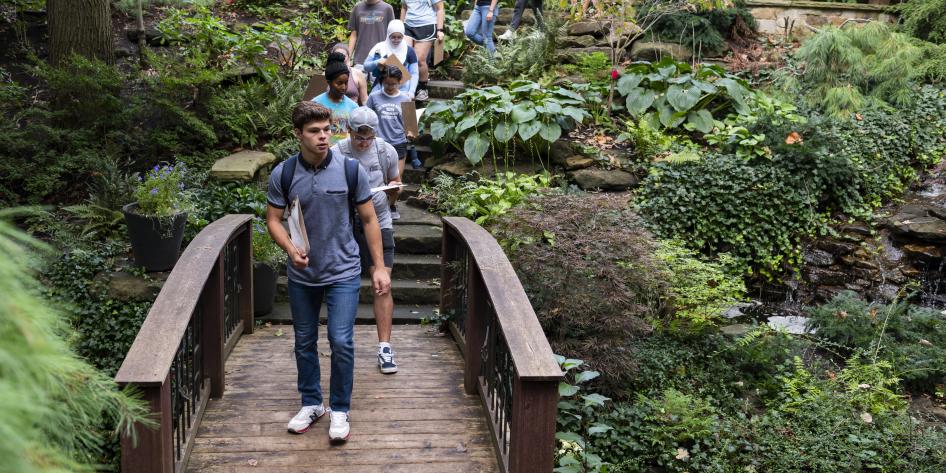 A class of students take their learning outdoors to the Cleveland Botanical Garden.