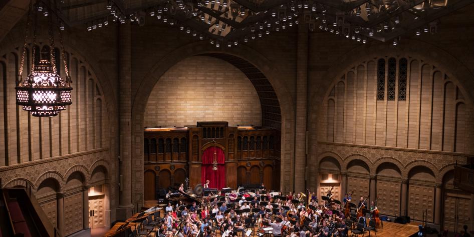 Students practice for a performance at the Maltz Performing Arts Center.