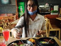 Student eating local cuisine while abroad