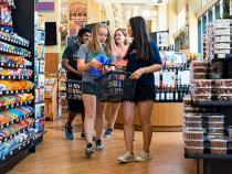 Students grocery shopping at Constantino's