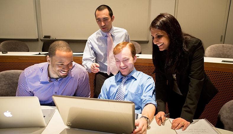 law students working as a group on a project