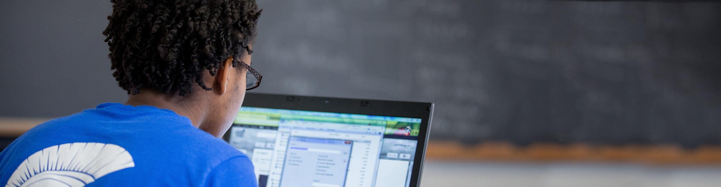 Student working on their computer