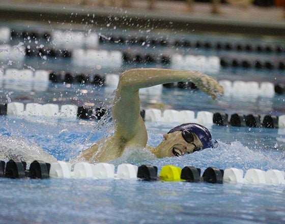 CWRU swimmer in the pool during a meet