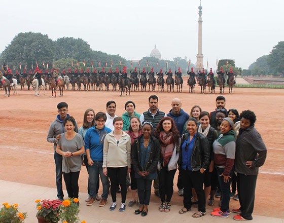 Students in a group of local people while studying abroad
