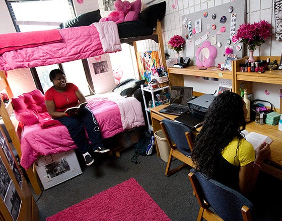 Students hanging out in their dorm room