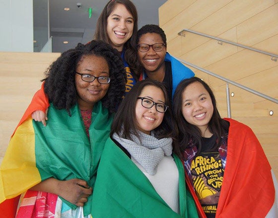Case African Student Association posing for a photo with their countries flags