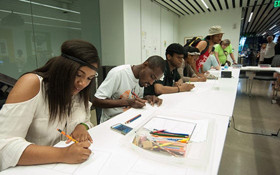 Students taking a drawing class in MOCA