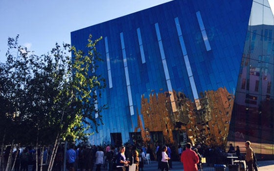 Exterior view of MOCA with people walking by