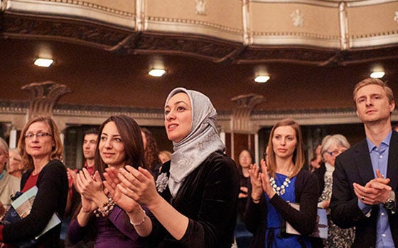 Audience clapping for performance