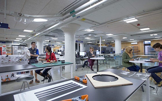 Students working on projects in think[box]