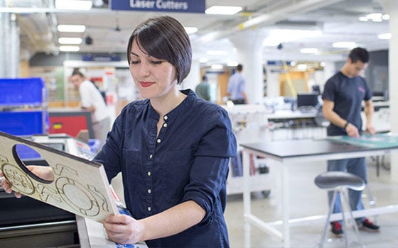 Female student working on a project in think[box]