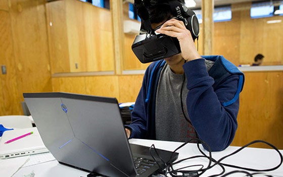 Student wearing a VR headset at the think[box]