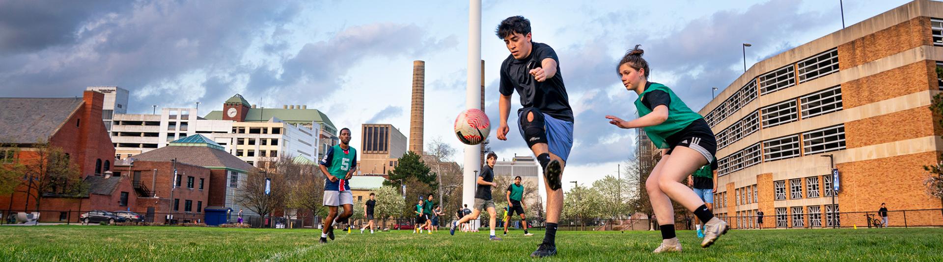 Students playing intramural soccer.