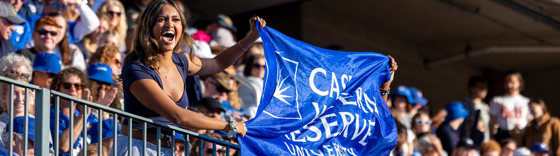 CWRU students at homecoming football game.
