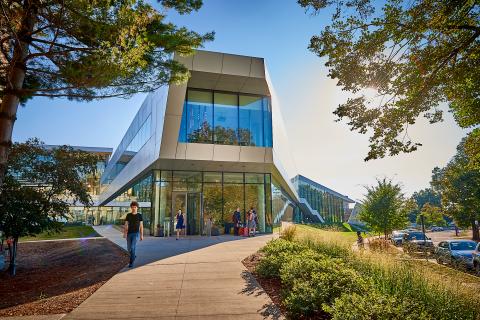 Linsalata entrance to Tinkham Veale center on with students walking by 