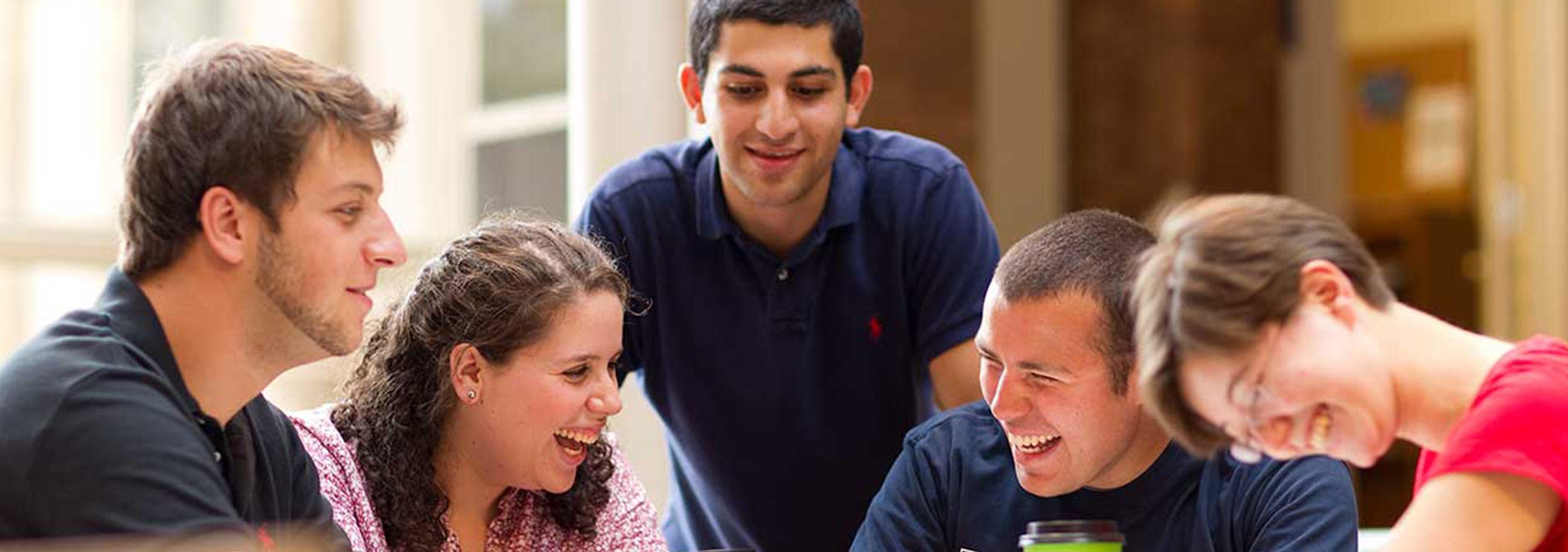 Students talking at a table