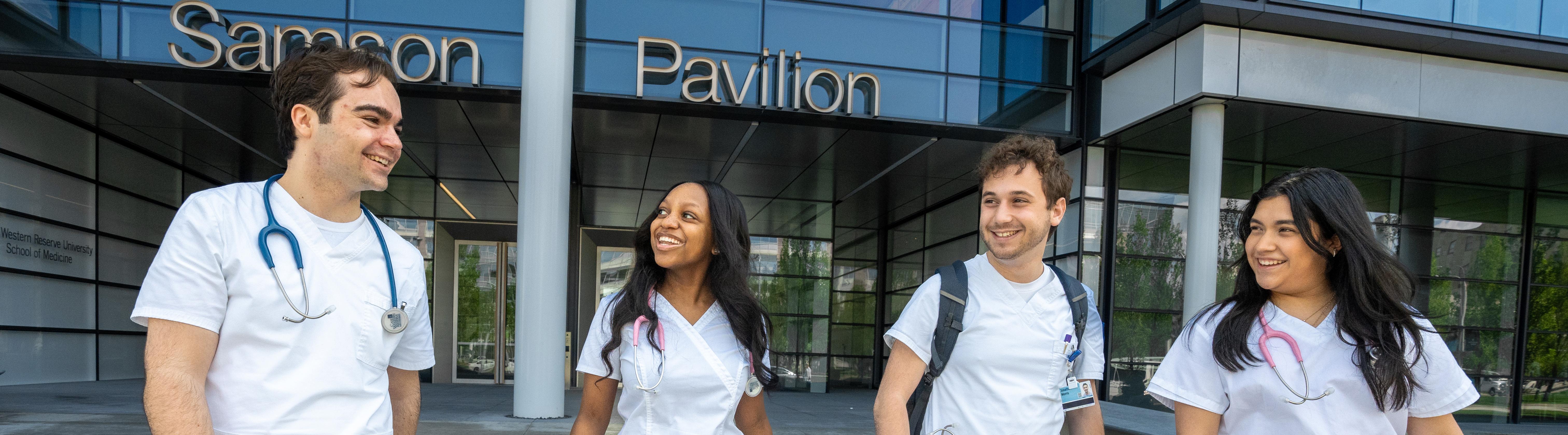 nurses walking in front of the HEC