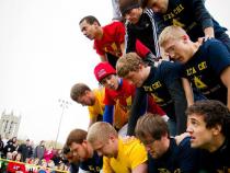 Fraternity brothers building a human pyramid