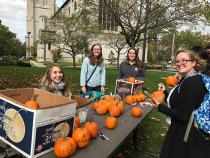 Random acts of kindness club giving away pumpkins