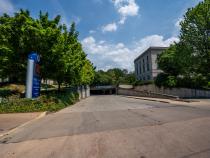 Photo of the entrance of a parking garage from the street