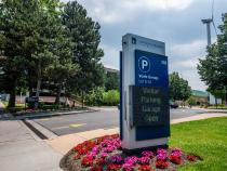 Photo of a sign for a parking garage for visiter parking