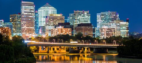 Photo of the D.C. city skyline, lit up at night