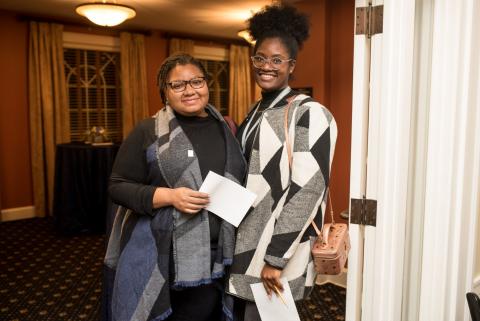 Two African American women at an African American Alumni Association event