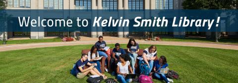 Students sitting in front of Kelvin Smith Library building, under a banner with the library's name on it