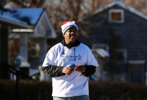 Donte Gibbs delivers Christmas gifts and holiday cheer in East Cleveland, as part of his nonprofit, Donte's Gift Express.