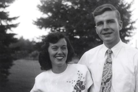 A black and white outdoor photo of Jane and Fred Shew as young adults